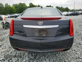 2013 Cadillac XTS Premium z VIN 2G61S5S37D9169935, wystawiony jako Copart lot #57515415 z przebiegiem 122 144 mil mil oraz Szkoda całkowita • Salvage title. Historia ofert i sprzedaży dostępna na DreamBid. Obrazek 6.