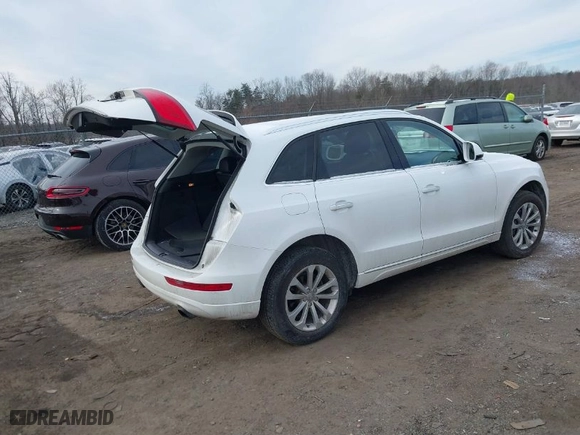 2016 Audi Q5 Premium with VIN WA1C2AFP1GA140297, listed as a IAAI auction lot 41374004 with 104,196 mi miles. Bid and sale history available at carsss.com. Image 4.