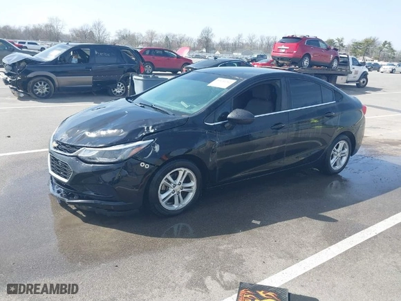 2018 Chevrolet Cruze LT with VIN 1G1BE5SM6J7210854, listed as a IAAI auction lot 39136762 with 112,023 mi miles. Bid and sale history available at carsss.com. Image 2.