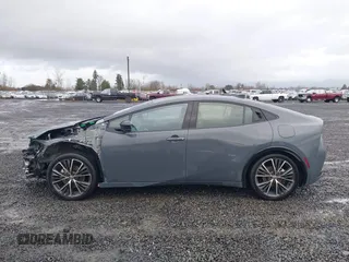 2024 Toyota Prius LE z VIN JTDADABU4R3015000, wystawiony jako IAAI lot #41147221 z przebiegiem 4 411 mil mil oraz . Historia ofert i sprzedaży dostępna na DreamBid. Obrazek 15.