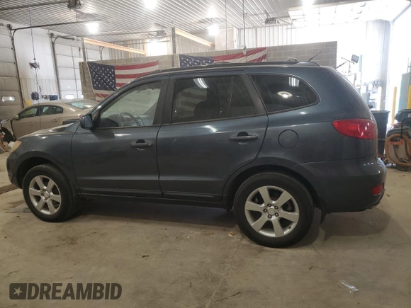 2009 Hyundai Santa Fe SE with VIN 5NMSH73E69H235016, listed as a Copart auction lot 56721295 with 180,214 mi miles and Salvage title. Bid and sale history available at DreamBid. Image 2.