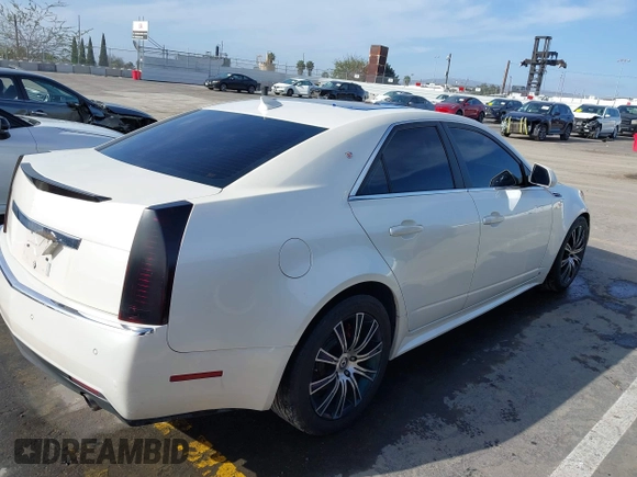 2010 Cadillac CTS with VIN 1G6DK5EVXA0102844, listed as a IAAI auction lot 41818267 with 127,517 mi miles and . Bid and sale history available at DreamBid. Image 4.