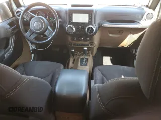 2015 Jeep Wrangler Unlimited Sahara with VIN 1C4BJWEG2FL561032, listed as a Copart auction lot 48885885 with 92,073 mi miles and Salvage Title. Bid and sale history available at carsss.com. Image 8.