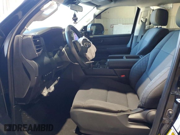 2023 Toyota Tundra SR z VIN 5TFKB5DB8PX113093, wystawiony jako Copart lot #80488324 z przebiegiem 24 200 mil mil oraz Szkoda całkowita • Salvage title. Historia ofert i sprzedaży dostępna na DreamBid. Obrazek 7.