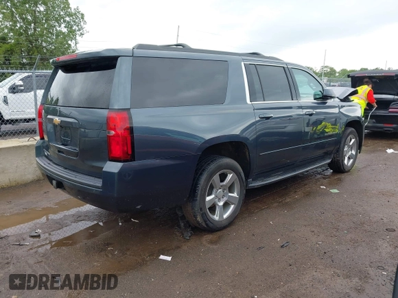 2019 Chevrolet Suburban LS with VIN 1GNSKGKC7KR244916, listed as a IAAI auction lot 42315858 with 69,555 mi miles and . Bid and sale history available at DreamBid. Image 4.