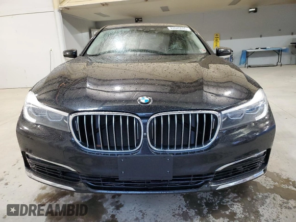2017 BMW 7 Series 740i xDrive with VIN WBA7E4C53HGU99097, listed as a Copart auction lot 43945695 with 117,790 mi miles and Salvage Title. Bid and sale history available at carsss.com. Image 5.