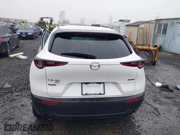 2021 Mazda CX-30 Select with VIN 3MVDMBBL3MM205256, listed as a IAAI auction lot 41302313 with 17,709 mi miles and . Bid and sale history available at DreamBid. Image 17.