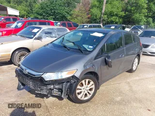 2013 Honda Insight EX with VIN JHMZE2H74DS002123, listed as a IAAI auction lot 42204860 with 279,376 mi miles and . Bid and sale history available at DreamBid. Image 2.