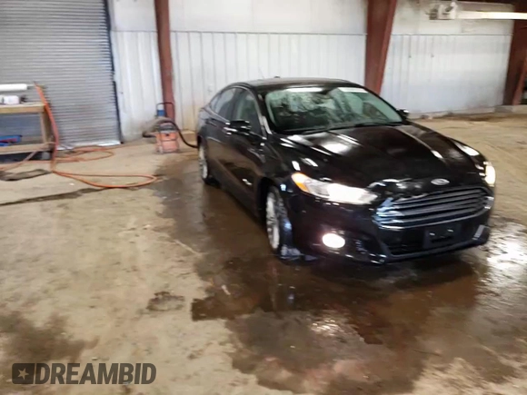 2014 Ford Fusion Titanium Hybrid z VIN 3FA6P0RUXER168706, wystawiony jako Copart lot #55362295 z przebiegiem 136 382 mil mil oraz Czysty tytuł • Clean title. Historia ofert i sprzedaży dostępna na DreamBid. Obrazek 13.