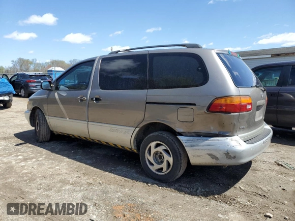 1999 Toyota Sienna LE with VIN 4T3ZF13C2XU112113, listed as a Copart auction lot 52162655 with 248,091 mi miles and Salvage Title. Bid and sale history available at carsss.com. Image 2.