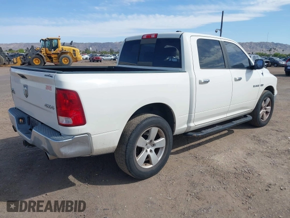 2009 Dodge 1500 SLT with VIN 1D3HV13T69S792700, listed as a IAAI auction lot 42180236 with 171,152 mi miles. Bid and sale history available at carsss.com. Image 4.