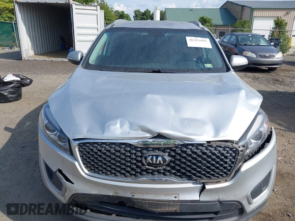 2018 Kia Sorento LX with VIN 5XYPGDA3XJG427112, listed as a IAAI auction lot 40303681 with 170,443 mi miles. Bid and sale history available at carsss.com. Image 6.