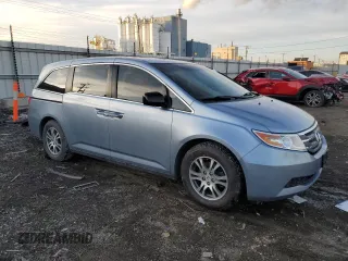2012 Honda Odyssey EX-L with VIN 5FNRL5H64CB002814, listed as a Copart auction lot 44134505 with 131,235 mi miles and Salvage Title. Bid and sale history available at carsss.com. Image 4.