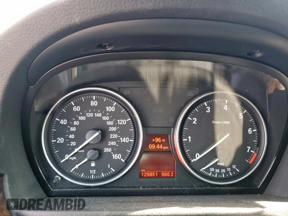 2011 BMW 3 Series 328i with VIN WBAPH7C50BE461757, listed as a Copart auction lot 62005405 with 129,851 mi miles and Salvage title. Bid and sale history available at DreamBid. Image 9.