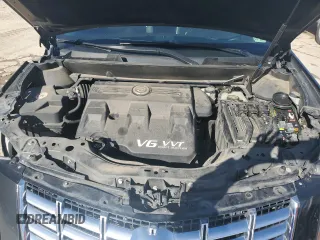 2015 Cadillac SRX Luxury Collection z VIN 3GYFNBE36FS608322, wystawiony jako Copart lot #88860835 z przebiegiem 141 627 mil mil oraz Szkoda całkowita • Salvage title. Historia ofert i sprzedaży dostępna na DreamBid. Obrazek 12.