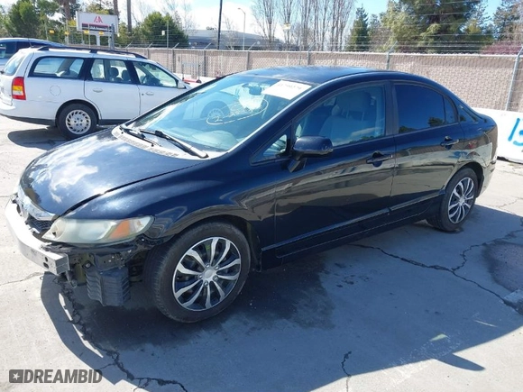 2010 Honda Civic Sdn LX with VIN 2HGFA1F55AH302155, listed as a IAAI auction lot 41799279 with 122,638 mi miles. Bid and sale history available at carsss.com. Image 2.