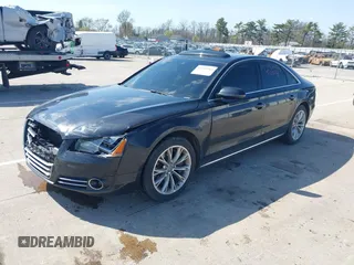 2011 Audi A8 with VIN WAUAVAFD5BN022388, listed as a IAAI auction lot 42102765 with 141,865 mi miles and . Bid and sale history available at DreamBid. Image 2.