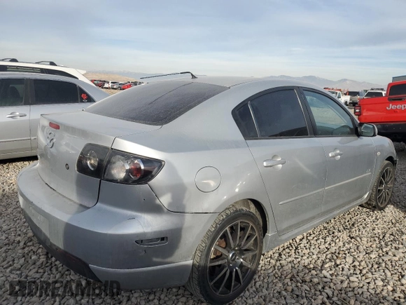 2006 Mazda 3 s with VIN JM1BK324261542255, listed as a Copart auction lot 84252034 with 196,030 mi miles and Salvage Title. Bid and sale history available at DreamBid. Image 3.