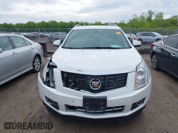2014 Cadillac SRX Performance Collection with VIN 3GYFNCE34ES519059, listed as a IAAI auction lot 42237351 with 80,578 mi miles and . Bid and sale history available at DreamBid. Image 13.