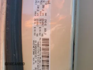 2016 Dodge Grand Caravan SXT with VIN 2C4RDGCG5GR219517, listed as a Copart auction lot 50052405 with 104,552 mi miles and Salvage Title. Bid and sale history available at DreamBid. Image 13.