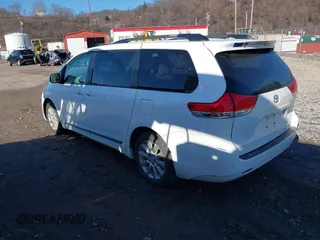2014 Toyota Sienna Ltd with VIN 5TDDK3DC6ES076778, listed as a IAAI auction lot 41387091 with 173,497 mi miles. Bid and sale history available at carsss.com. Image 3.