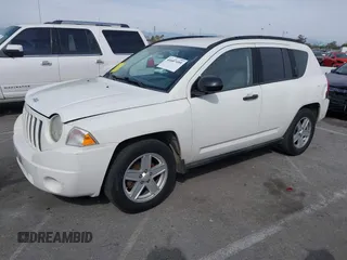 2007 Jeep Compass Sport with VIN 1J8FT47W77D145745, listed as a IAAI auction lot 41687495 with 218,231 mi miles. Bid and sale history available at carsss.com. Image 2.