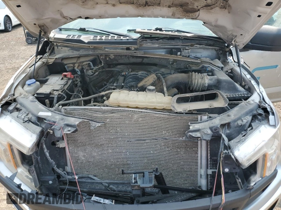 2020 Ford F-150 XL with VIN 1FTFX1E57LKD31540, listed as a Copart auction lot 59100905 with 83,177 mi miles and Salvage title. Bid and sale history available at DreamBid. Image 11.