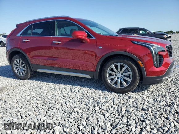 2020 Cadillac XT4 FWD Premium Luxury with VIN 1GYFZCR47LF040062, listed as a Copart auction lot 52309415 with 12,517 mi miles and Salvage title. Bid and sale history available at DreamBid. Image 4.