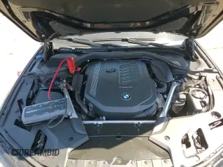 2023 BMW 5 Series 540i xDrive z VIN WBA73BJ02PWX99963, wystawiony jako Copart lot #63969205 z przebiegiem 27 720 mil mil oraz Szkoda całkowita • Salvage title. Historia ofert i sprzedaży dostępna na DreamBid. Obrazek 13.