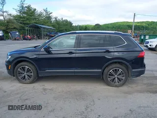 2018 Volkswagen Tiguan SEL z VIN 3VV2B7AXXJM145781, wystawiony jako IAAI lot #42273176 z przebiegiem 86 610 mil mil oraz . Historia ofert i sprzedaży dostępna na DreamBid. Obrazek 15.