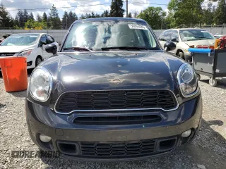 2013 MINI Countryman S ALL4 z VIN WMWZC5C56DWP33270, wystawiony jako Copart lot #56804085 z przebiegiem 141 637 mil mil oraz Szkoda całkowita • Salvage title. Historia ofert i sprzedaży dostępna na DreamBid. Obrazek 5.