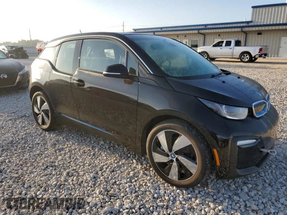 2021 BMW i3 with VIN WBY8P2C03M7K07077, listed as a Copart auction lot 63186024 with 6,381 mi miles and Salvage Title. Bid and sale history available at carsss.com. Image 4.