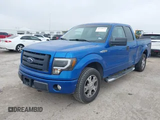 2009 Ford F-150 STX with VIN 1FTRX12W09KA69038, listed as a IAAI auction lot 41520939 with 220,092 mi miles. Bid and sale history available at carsss.com. Image 2.