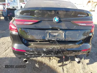 2021 BMW 2 Series 228i xDrive with VIN WBA73AK03M7H66827, listed as a IAAI auction lot 41682959 with 57,875 mi miles and . Bid and sale history available at DreamBid. Image 6.