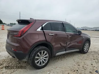 2023 Cadillac XT4 FWD Premium Luxury with VIN 1GYFZCR48PF100078, listed as a Copart auction lot 55955865 with 23,509 mi miles and Salvage title. Bid and sale history available at DreamBid. Image 3.