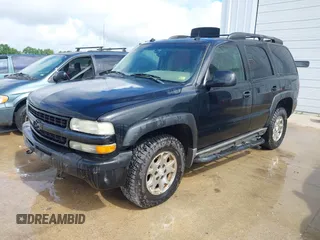 2003 Chevrolet Tahoe Z71 with VIN 1GNEK13Z93R267077, listed as a IAAI auction lot 42504842 with 294,707 mi miles and . Bid and sale history available at DreamBid. Image 2.
