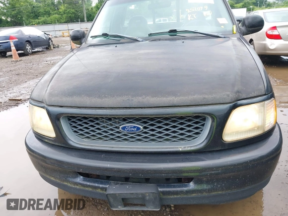 1998 Ford F-150 with VIN 1FTYF17W0WNC12927, listed as a IAAI auction lot 42621641 with 251,079 mi miles and . Bid and sale history available at DreamBid. Image 6.