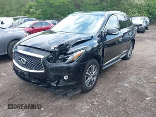 2020 Infiniti QX60 LUXE with VIN 5N1DL0MM8LC516594, listed as a IAAI auction lot 42136299 with 92,747 mi miles. Bid and sale history available at carsss.com. Image 2.