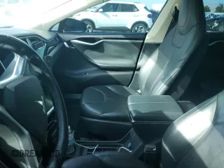 2014 Tesla Model S 60 with VIN 5YJSA1H1XEFP32590, listed as a Copart auction lot 64424145 with Not provided miles and Clean title. Bid and sale history available at DreamBid. Image 7.