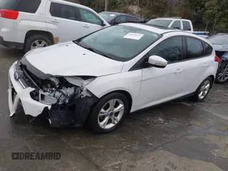 2014 Ford Focus SE with VIN 1FADP3K28EL386918, listed as a IAAI auction lot 41620107 with 118,098 mi miles and . Bid and sale history available at DreamBid. Image 2.