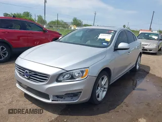 2015 Volvo S60 T5 Drive-E Premier with VIN YV140MFK5F1344597, listed as a IAAI auction lot 41822415 with 103,301 mi miles and . Bid and sale history available at DreamBid. Image 6.