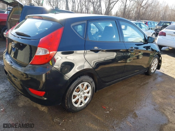 2013 Hyundai Accent GL with VIN KMHCT5AE6DU128989, listed as a IAAI auction lot 41744428 with 92,102 mi miles. Bid and sale history available at carsss.com. Image 4.