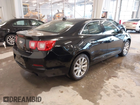 2013 Chevrolet Malibu LTZ with VIN 1G11H5SA1DU129095, listed as a IAAI auction lot 41556006 with 170,477 mi miles and . Bid and sale history available at DreamBid. Image 4.