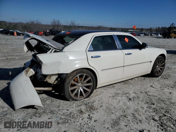 2006 Chrysler 300 C with VIN 2C3KA63H56H477106, listed as a Copart auction lot 48004705 with 174,593 mi miles and Salvage Title. Bid and sale history available at carsss.com. Image 3.