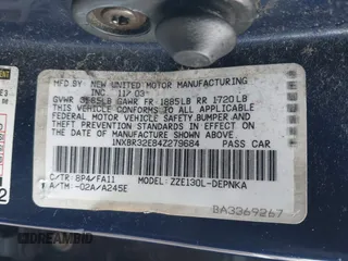 2004 Toyota Corolla CE with VIN 1NXBR32E84Z279684, listed as a IAAI auction lot 41922843 with Not Provided miles. Bid and sale history available at carsss.com. Image 9.