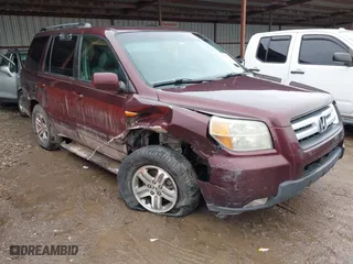 2007 Honda Pilot EX-L with VIN 2HKYF18767H538286, listed as a IAAI auction lot 41473762 with 239,429 mi miles. Bid and sale history available at carsss.com. Image 1.
