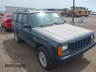 1993 Jeep Cherokee Sport z VIN 1J4FJ68S0PL626862, wystawiony jako IAAI lot #42239274 z przebiegiem 183 227 mil mil oraz . Historia ofert i sprzedaży dostępna na DreamBid. Obrazek 1.