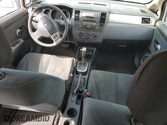 2011 Nissan Versa S with VIN 3N1BC1AP3BL452650, listed as a Copart auction lot 52206885 with 168,427 mi miles and Salvage title. Bid and sale history available at DreamBid. Image 8.