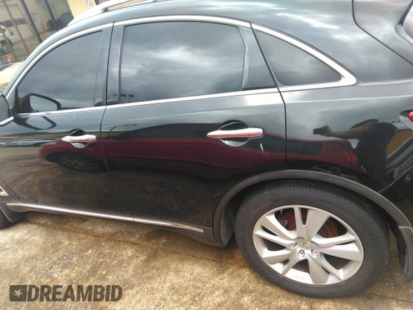2012 Infiniti FX with VIN JN8AS1MU1CM121512, listed as a IAAI auction lot 42201447 with 285,357 mi miles. Bid and sale history available at carsss.com. Image 14.