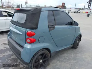 2008 Smart fortwo Passion with VIN WMEEK31X28K158970, listed as a IAAI auction lot 42073256 with 66,703 mi miles. Bid and sale history available at carsss.com. Image 4.
